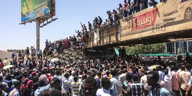 Protesters rally in front of the military headquarters in the capital Khartoum, Sudan, Monday, April 8, 2019. Organizers behind anti-government demonstrations in Sudan said security forces attempted to break up a sit-in outside the military headquarters. A spokeswoman for the Sudanese Professionals Association told The Associated Press that clashes erupted early Monday between security forces and protesters, who have been camped out in front of the complex in Khartoum since Saturday. (AP Photo)