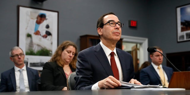 Treasury Secretary Steven Mnuchin testifies Tuesday before a House Appropriations subcommittee during a hearing on President Trump's budget. (AP Photo/Patrick Semansky)