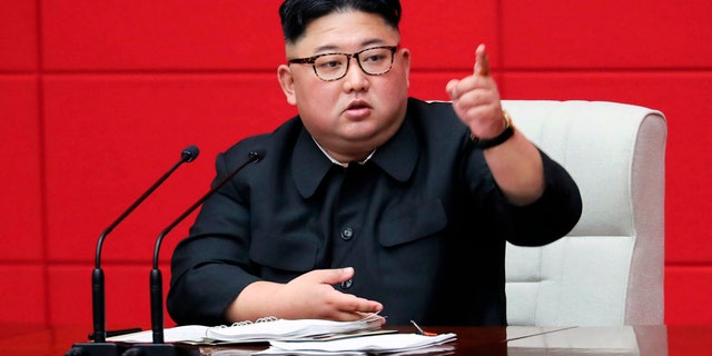 In this photo provided by the North Korean government, North Korean leader Kim Jong Un attends the 4th Plenary Meeting of the 7th Central Committee of the Workers' Party of Korea in Pyongyang. (Korean Central News Agency/Korea News Service via AP)