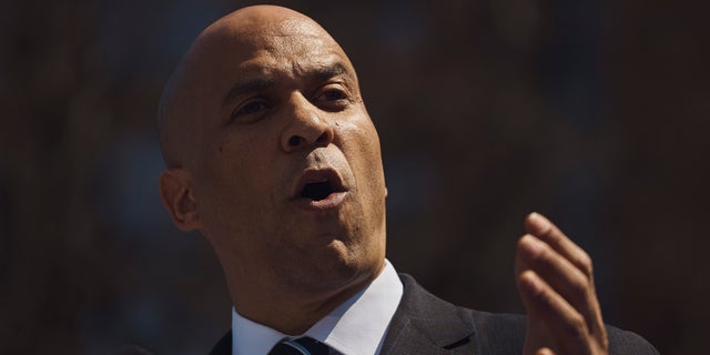 Democratic presidential candidate Sen. Cory Booker, D-N.J., talks to the crowd during a hometown kickoff for his national presidential campaign tour at Military Park in downtown Newark on Saturday. (AP Photo/Andres Kudacki)