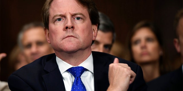 FILE - In this Sept. 27, 2018, file photo, White House counsel Don McGahn listens as Supreme court nominee Brett Kavanaugh testifies before the Senate Judiciary Committee on Capitol Hill in Washington. Rep. Jerrold Nadler, the chairman of the House Judiciary Committee has subpoenaed McGahn for testimony following the release of the report from special counsel Robert Mueller. (Saul Loeb/Pool Photo via AP, File)