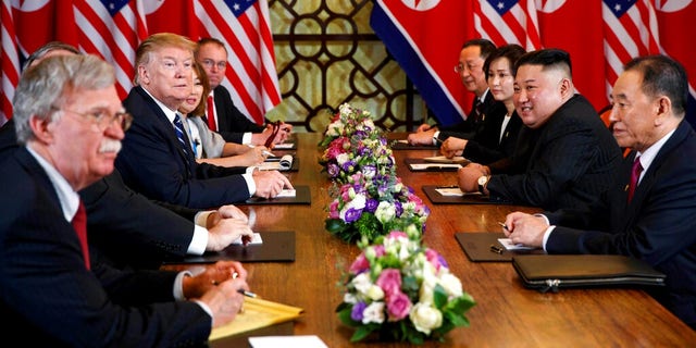 President Donald Trump speaks during a meeting with North Korean leader Kim Jong Un Thursday, Feb. 28, 2019, in Hanoi. At front right is Kim Yong Chol, a North Korean senior ruling party official and former intelligence chief.