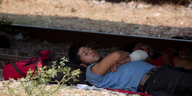 A Central American migrant takes a nap in the shade under a freight car during his trip to the US-Mexico border, at Ixtepec, in the state of Oaxaca, Mexico, Tuesday, April 23, 2019. While end 2018 and early 2019, the Mexican authorities They issued humanitarian visas and processed asylum applications. They have now largely stopped doing so, forcing migrants to wait weeks in the southern city of Mapastepec for visas that never come. (AP Photo / Moises Castillo)
