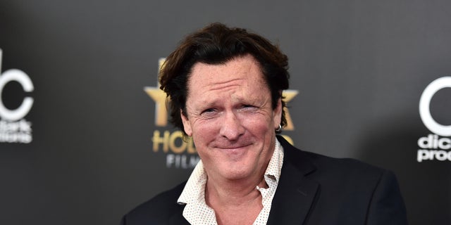 DOSSIER - In this archival photo from November 1, 2015, Michael Madsen presents himself at the Hollywood Film Awards at the Beverly Hilton Hotel in Beverly Hills, California. Prosecutors charged Madsen with two counts of drunk driving after the actor drove his SUV into a pole last month.