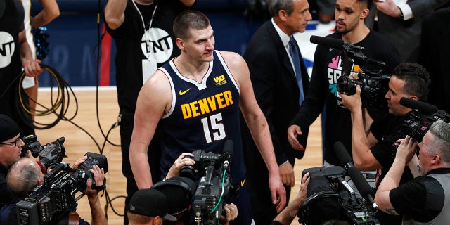 Denver Nuggets center Nikola Jokic faces the cameras after the second half of Game 7 of an NBA basketball first-round playoff series, Saturday, April 27, 2019, in Denver. The Nuggets won 90-86 to advance to the second round against Portland. (Associated Press)
