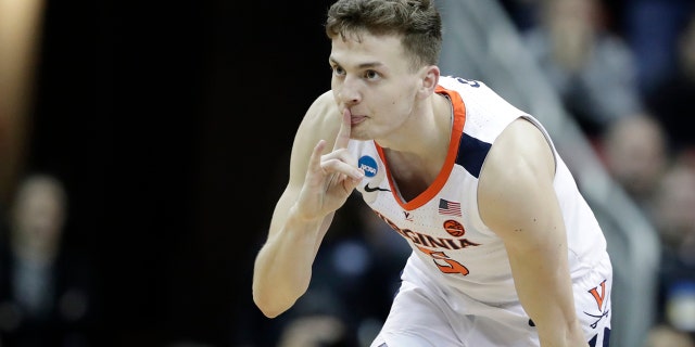 Virginia's Kyle Guy reacts during the second half of the men's NCAA Tournament college basketball South Regional final game against Purdue, Saturday, March 30, 2019, in Louisville, Ky.