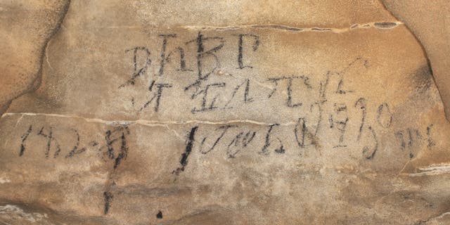 Cherokee syllabary inscription from almost a mile inside the Manitou Cave.