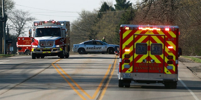 Police and emergency personnel respond to a hazardous materials situation that blocked off roads and closed schools in Beach Park, Ill., on Thursday, April 25, 2019, (Joe Shuman/Chicago Tribune via AP)