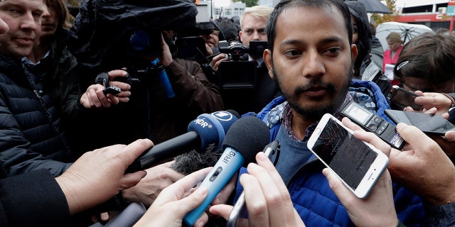 Tofazzal Alam, a survivor of the Linwood Mosque shootings, speaks to the media outside the High Court in Christchurch, New Zealand on Friday. (Associated Press)