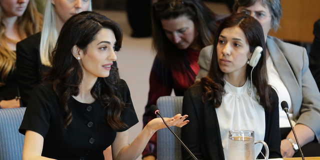 While Nadia Murad Basee Taha, right, listens, Amal Clooney speaks at a Security Council meeting on sexual violence at UN headquarters on Tuesday, April 23, 2019. (AP Photo / Seth Wenig)