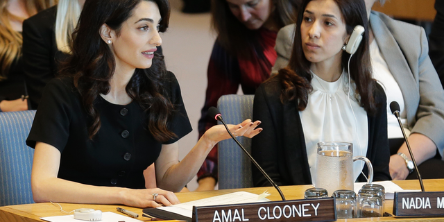 While Nadia Murad Basee Taha, right, listens, Amal Clooney speaks at a Security Council meeting on sexual violence at UN headquarters on Tuesday, April 23, 2019. (AP Photo / Seth Wenig)