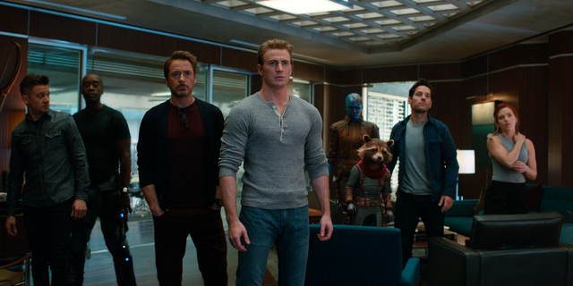 Jeremy Renner, Don Cheadle, Robert Downey Jr., Chris Evans, Karen Gillan, the character Rocket, voiced by Bradley Cooper, Paul Rudd and Scarlett Johansson in a scene from “Avengers: Endgame.” (Disney/Marvel Studios via AP)