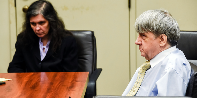 In this Aug. 3, 2018 file photo, Louise Turpin, left, and her husband, David Turpin appear in Superior Court in Riverside, Calif. 