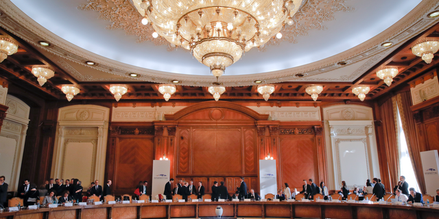 European Union Finance ministers prepare for a session at the informal meeting of European Union Economic Financial Affairs in Bucharest, Romania, Friday, April 5, 2019. (AP Photo/Vadim Ghirda)
