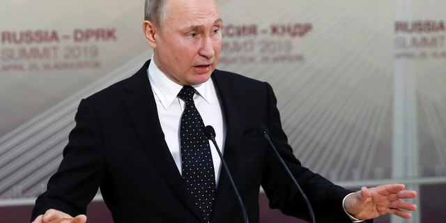 Russian President Vladimir Putin gestures while speaking to the media after his talks with North Korea's leader Kim Jong Un talk in Vladivostok, Russia, Thursday, April 25, 2019. President Vladimir Putin says after talks with North Korean leader Kim Jong Un that Pyongyang is ready to proceed toward denuclearization, but that it needs serious security guarantees to do so.