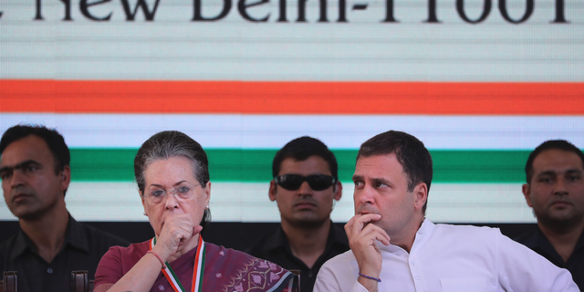 In this in April 2, 2019, photo, United Progressive Alliance Chairperson Sonia Gandhi, second left, sits with her son and Congress Party President Rahul Gandhi, second right, at the India National Congress party headquarters to release its manifesto for the upcoming general election, in New Delhi, India. Jawaharlal Nehru, his daughter Indira Gandhi and her son Rajiv Gandhi ruled the country for about a half a century cumulatively after India won independence from Britain in 1947. Rajiv Gandhi's son, Rahul Gandhi, is now the Congress party leader and a potential candidate for prime minister if the opposition can stitch an alliance to stop the Modi juggernaut. (AP Photo/Manish Swarup)