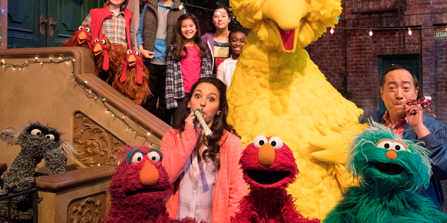 This image released by HBO shows the cast of the popular children's show "Sesame Street."