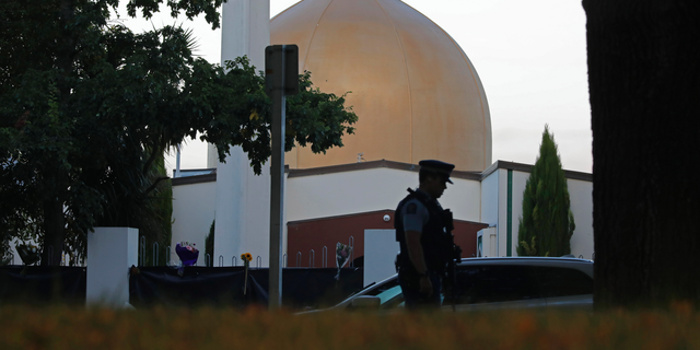 A police officer stands guard in front of the Al Noor mosque in Christchurch, New Zealand.