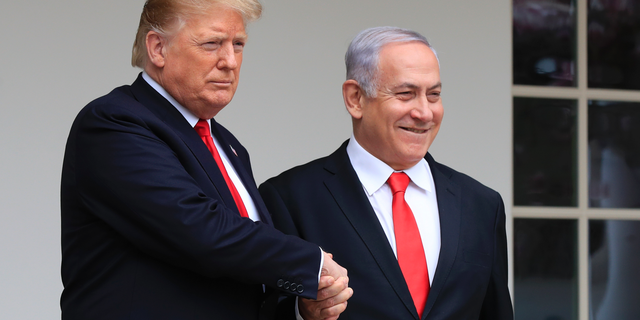 In this Monday, March 25, 2019 file photo, President Donald Trump welcomes visiting Israeli Prime Minister Benjamin Netanyahu to the White House in Washington. In a tight race for re-election, Israel’s prime minister has gotten a welcome lift from his friend in the White House. In the run-up to the April 9 vote, Netanyahu has hosted Secretary of State Mike Pompeo, visited Trump in the White House and received American recognition of Israeli sovereignty over the Golan Heights, which Israel seized from Syria during the 1967 Mideast war.