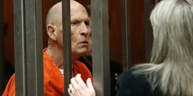 Joseph James DeAngelo, suspected of being the Golden State Killer, talks with his attorney, Diane Howard, in Sacramento County Superior Court after prosecutors announced they will seek the death penalty if he is convicted in his case, Wednesday, April 10, 2019, in Sacramento, Calif. (AP Photo/Rich Pedroncelli)