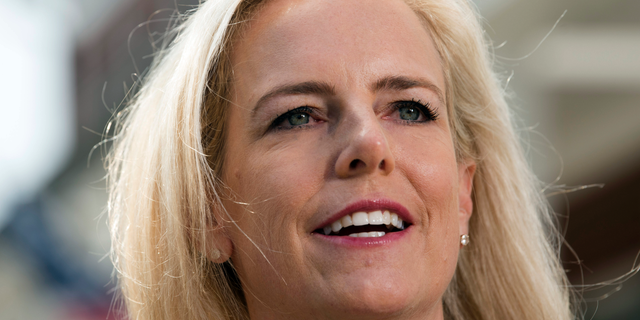 Homeland Security Secretary Kirstjen Nielsen talks outside her home in Alexandria, Va., on Thursday, April 8, 2019. Nielsen says she continues to support the president’s goal of securing the border in her first public remarks since her surprise resignation. (AP Photo/Kevin Wolf)