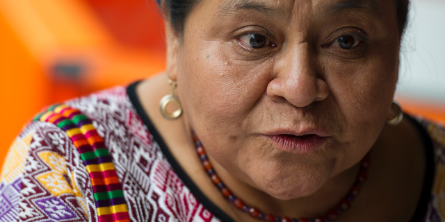 FILE - In this Aug. 17, 2016 file photo, Nobel Peace Prize laureate Rigoberta Menchu speaks during an interview in Mexico City. Menchu, along with other Nobel prize winners, expressed their concern on Thursday, April 4, 2019, for the political and human rights situation in Guatemala, which they believe is deteriorating.  (AP Photo/Nick Wagner, File)
