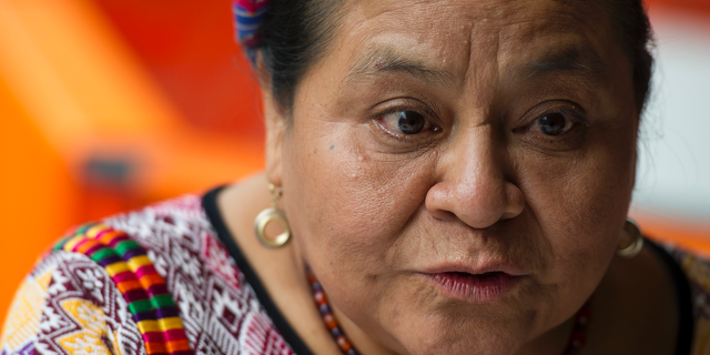 FILE - In this Aug. 17, 2016 file photo, Nobel Peace Prize laureate Rigoberta Menchu speaks during an interview in Mexico City. Menchu, along with other Nobel prize winners, expressed their concern on Thursday, April 4, 2019, for the political and human rights situation in Guatemala, which they believe is deteriorating. (AP Photo/Nick Wagner, File)