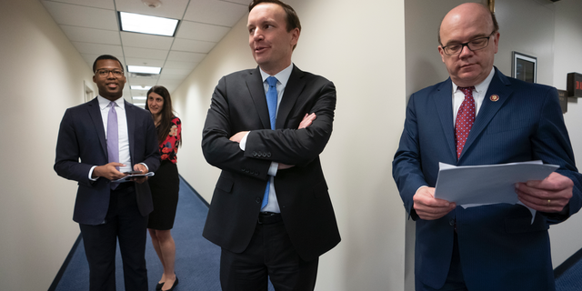 Sen. Chris Murphy, D-Conn., center, meets with House Rules Committee Chair James McGovern, D-Mass., right, after the House voted to end American involvement in the Yemen war, rebuffing the Trump administration's support for the Saudi-led military campaign, on Capitol Hill in Washington, Thursday, April 4, 2019, though President Trump is expected to veto it. It's the first time Congress has invoked the decades-old War Powers Resolution to try and stop a foreign conflict. (AP Photo/J. Scott Applewhite)