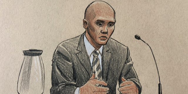 This courtroom sketch depicts former Minneapolis police officer Mohamed Noor on the witness stand Thursday, April 25, 2019, in Minneapolis during his trial in the fatally shooting of an unarmed Australian woman, Justine Ruszczyk Damond, in July 2017 after she called 911 to report a possible sexual assault behind her home. Noor testified Thursday that he saw fear in his partner's eyes, then saw a woman in a pink shirt with blond hair appear at the partner's window and raise her right arm before he fired his gun "to stop the threat." (Cedric Hohnstadt via AP)