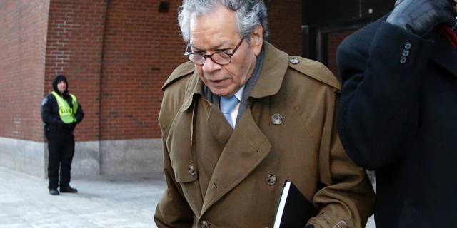 FILE - In this Jan. 30, 2019, file photo, Insys Therapeutics founder John Kapoor leaves federal court in Boston. He is one of four former company executives accused of scheming to bribe doctors into prescribing a powerful fentanyl painkiller. Lawyers are delivering their closing arguments Thursday, April 4, 2019, in the trial. (AP Photo/Steven Senne, File)