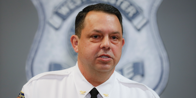 West Chester Chief of Police Joel Herzog speaks to reporters during a news conference, Monday, April 29, 2019, in West Chester, Ohio. Multiple people were found dead at an apartment complex in Ohio after a man called 911 saying he had returned home to find his wife and family members on the ground and bleeding. Herzog said that police were searching the area for any suspect, and there was no immediate threat to the community. (AP Photo/John Minchillo)