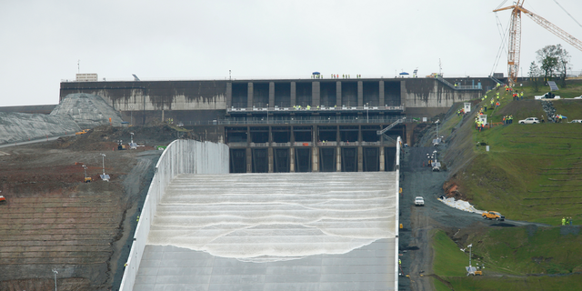 Water flows down the Oroville Dam spillway in Oroville, Calif., Tuesday, April 2, 2019. California officials opened the flood-control spillway at the nation's tallest dam for the first time since it was rebuilt after it crumbled during heavy rains two years ago.(AP Photo/Rich Pedroncelli)