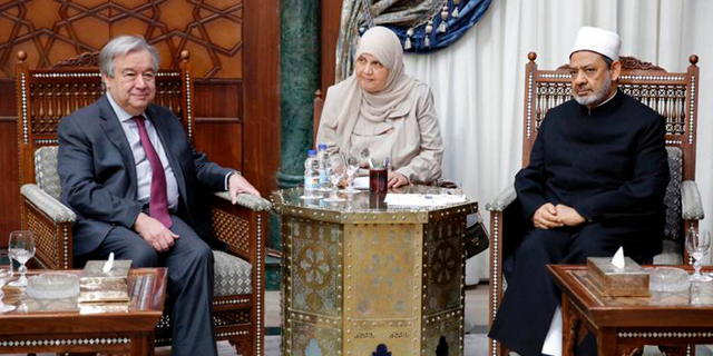 This photo released by Al Azhar, shows U.N. Secretary-General Antonio Guterres, left, during a meeting with Muslim cleric Sheikh Ahmed el-Tayeb, the grand imam, at the Al Azhar headquarters in Cairo, Egypt, Tuesday April 2, 2019. The U.N. chief has expressed solidarity with Muslims the world over during a visit to Cairo, denouncing hate speech and racism, as well as anti-Semitism. (Al Azhar via AP)