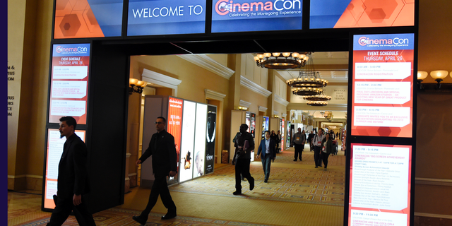 CinemaCon attendees walking through the lobby during CinemaCon 2018 in Las Vegas, the official convention of the National Association of Theatre Owners.