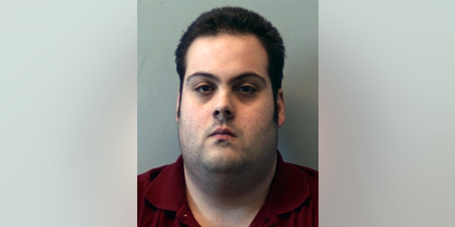 This booking photo released Thursday, March 1, 2018, by the Beverly Police Department shows Daniel Frisiello, of Beverly, Mass., accused of mailing five envelopes containing a white powder. Prosecutors are seeking three years in prison for Frisiello who admitted to sending threatening letters filled with white powder to President Donald Trump’s sons and others. Frisiello is set to be sentenced Friday, April 19, 2019, in Boston federal court.