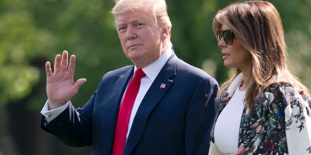 Without taking questions from reporters about the Mueller report, President Donald Trump and first lady Melania Trump walk to board Marine One for the short trip to Joint Base Andrews then on to his estate in Palm Beach, Fla., at the White House in Washington, Thursday, April 18, 2019. (Associated Press)