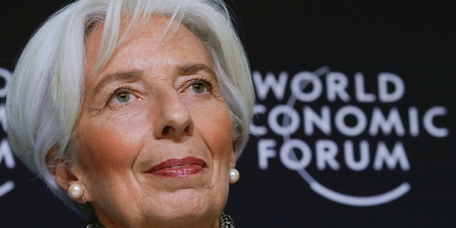 FILE - In this Jan. 21, 2019 file photo, International Monetary Fund Managing Director Christine Lagarde briefs the media during a news conference at the annual meeting of the World Economic Forum in Davos. The head of the 189-nation International Monetary Fund said Tuesday, April 2 the global economy is at a “delicate moment” with a hoped-for rebound in growth later this year being threatened by a variety of factors such as rising trade tensions between the world’s two biggest economies. Lagarde said the IMF does not forecast a recession in its updated economic outlook to be released next week but she called the current situation “precarious” and vulnerable to policy mistakes. (AP Photo/Markus Schreiber, File)