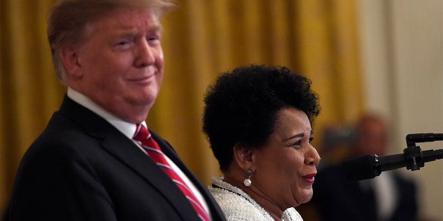 President Trump reacts as Johnson speaks at the 2019 Prison Reform Summit and First Step Act Celebration at the White House, April 1, 2019. (AP Photo/Susan Walsh)