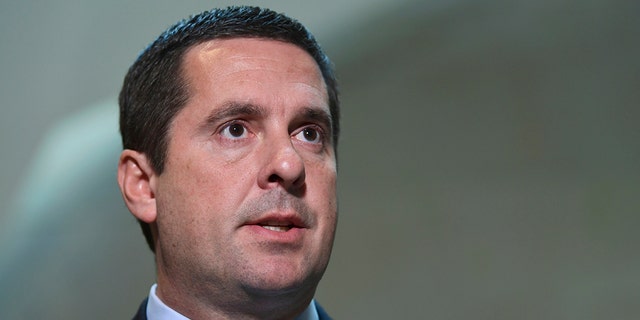 File-This Oct. 24, 2017, file photo shows House Intelligence Committee Chairman Rep. Devin Nunes, R-Calif., speaking on Capitol Hill in Washington. Twitter accounts linked to Russian influence operations are pushing a conservative meme related to the investigation of Russian election interference, researchers say. (AP Photo/Susan Walsh, File)
