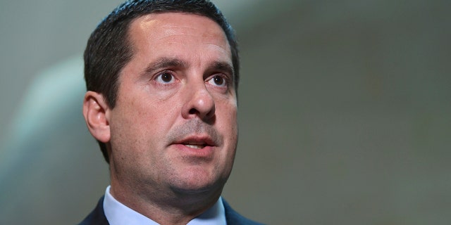 File-This Oct. 24, 2017, file photo shows House Intelligence Committee Chairman Rep. Devin Nunes, R-Calif., speaking on Capitol Hill in Washington. Twitter accounts linked to Russian influence operations are pushing a conservative meme related to the investigation of Russian election interference, researchers say. (AP Photo/Susan Walsh, File)