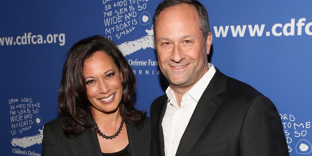 Then-California Attorney General Kamala Harris and lawyer Douglas Emhoff (R) attend Children's Defense Fund - California Hosts 24th Annual Beat The Odds Awards at Book Bindery on December 4, 2014 in Culver City, California. (Photo by Jesse Grant/Getty Images for Children's Defense Fund)