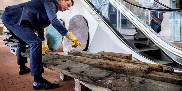 Wooden beams were also recovered from the shipwreck.