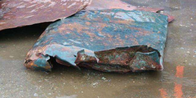 Copper plates discovered at the shipwreck site.