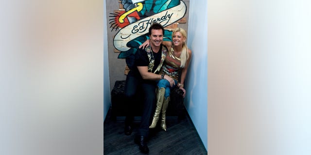 Gary Berman, seen here in 2007 with Tara Reid at the launch of a boutique in Australia, had previously held the rights to the Ed Hardy name in Australia and the U.K., according to his website.