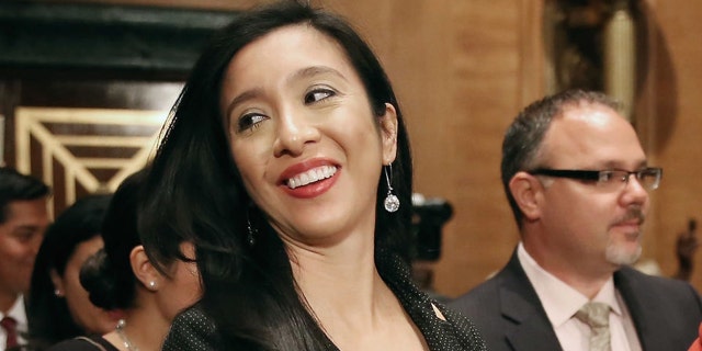 FILE: Erica Lira Castro (C), wife of Julian Castro, attends his confirmation hearing before the Senate Banking, Housing and Urban Affairs Committee in the Dirksen Senate Office Building on Capitol Hill June 17, 2014 in Washington, DC. (Photo by Chip Somodevilla/Getty Images)