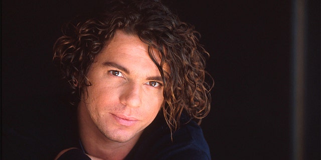 Michael Hutchence of INXS, studio portrait, London, 1990.