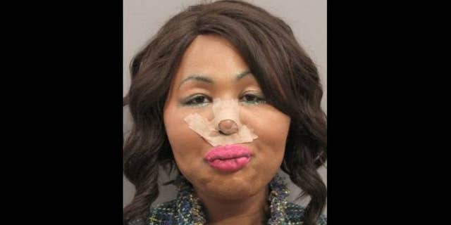 Jimmy Maurice Lewis II, known as "Iconic Facce," allegedly robbed a bank to pay for her plastic surgery. (Gulfport Police Department)