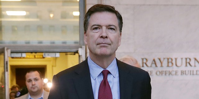Former Federal Bureau of Investigation Director James Comey leaves the Rayburn House Office Building after testifying to the House Judiciary and Oversight and Government Reform committees on Capitol Hill December 07, 2018 in Washington, DC. House Republicans subpoenaed Comey to testify behind closed doors about investigations into Hillary Clinton’s email server and whether President Trump’s campaign advisers colluded with the Russian government to steer the outcome of the 2016 presidential election. 