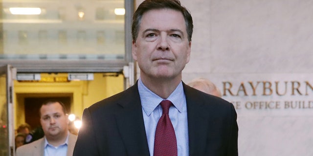Former Federal Bureau of Investigation Director James Comey leaves the Rayburn House Office Building after testifying to the House Judiciary and Oversight and Government Reform committees on Capitol Hill December 07, 2018 in Washington, DC. House Republicans subpoenaed Comey to testify behind closed doors about investigations into Hillary Clinton’s email server and whether President Trump’s campaign advisers colluded with the Russian government to steer the outcome of the 2016 presidential election.