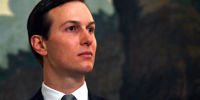 White House adviser Jared Kushner, seen above during a proclamation signing with President Trump in March, is said to have been a driving force behind the latest White House immigration proposal. (AP Photo/Susan Walsh)